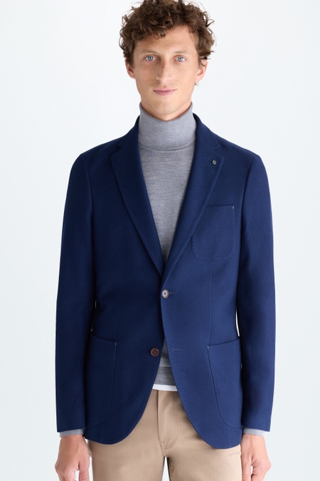 CHAQUETA RELAXED FIT ESTRUCTURA ALGODÓN