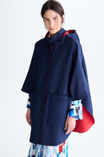 Hooded reversible technical cape