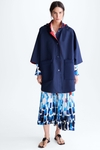 Hooded reversible technical cape