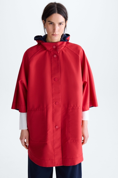 Hooded reversible technical cape