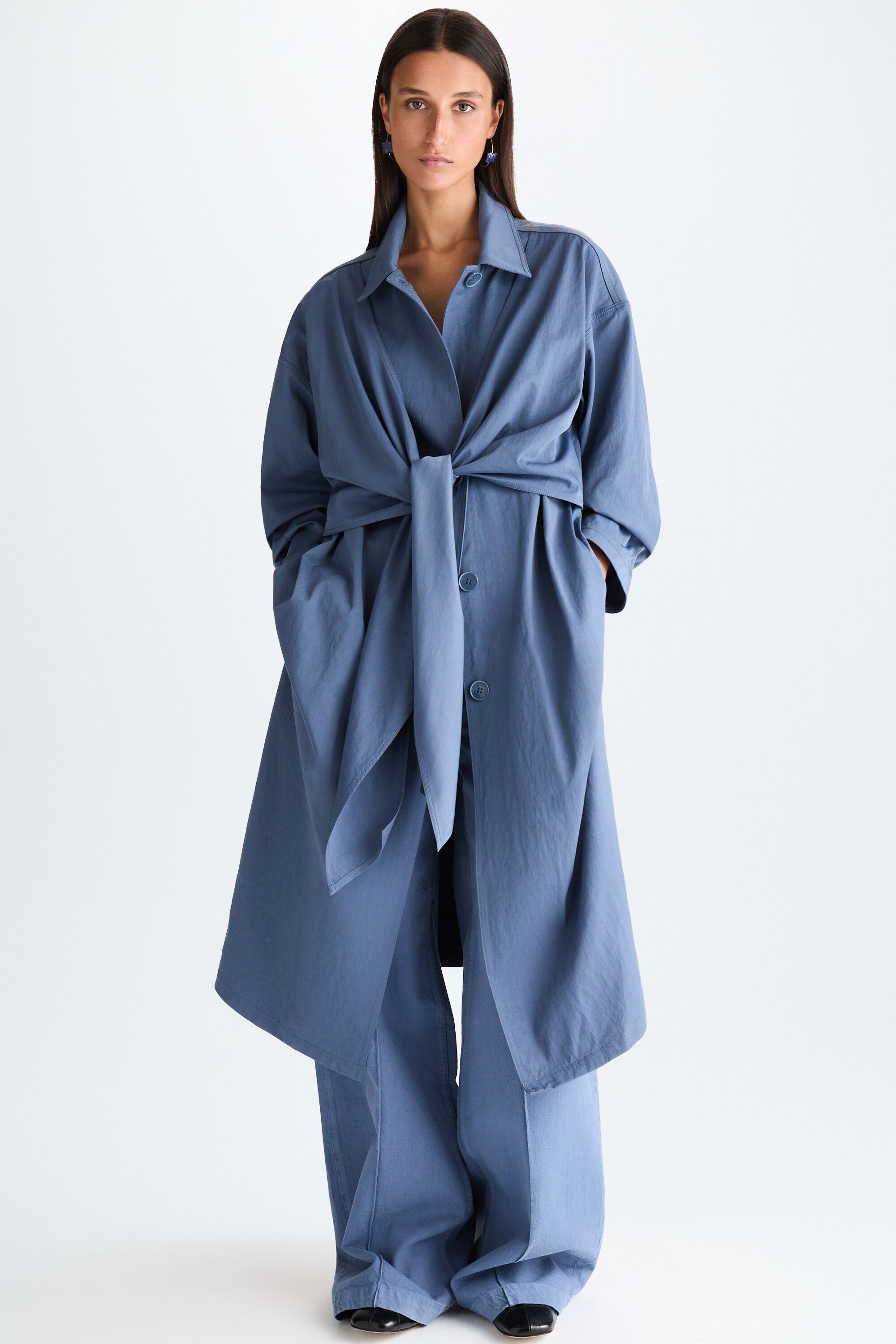 Gabardina guardapolvo técnica lazada