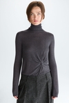 Turtleneck draped knit fitted sweater