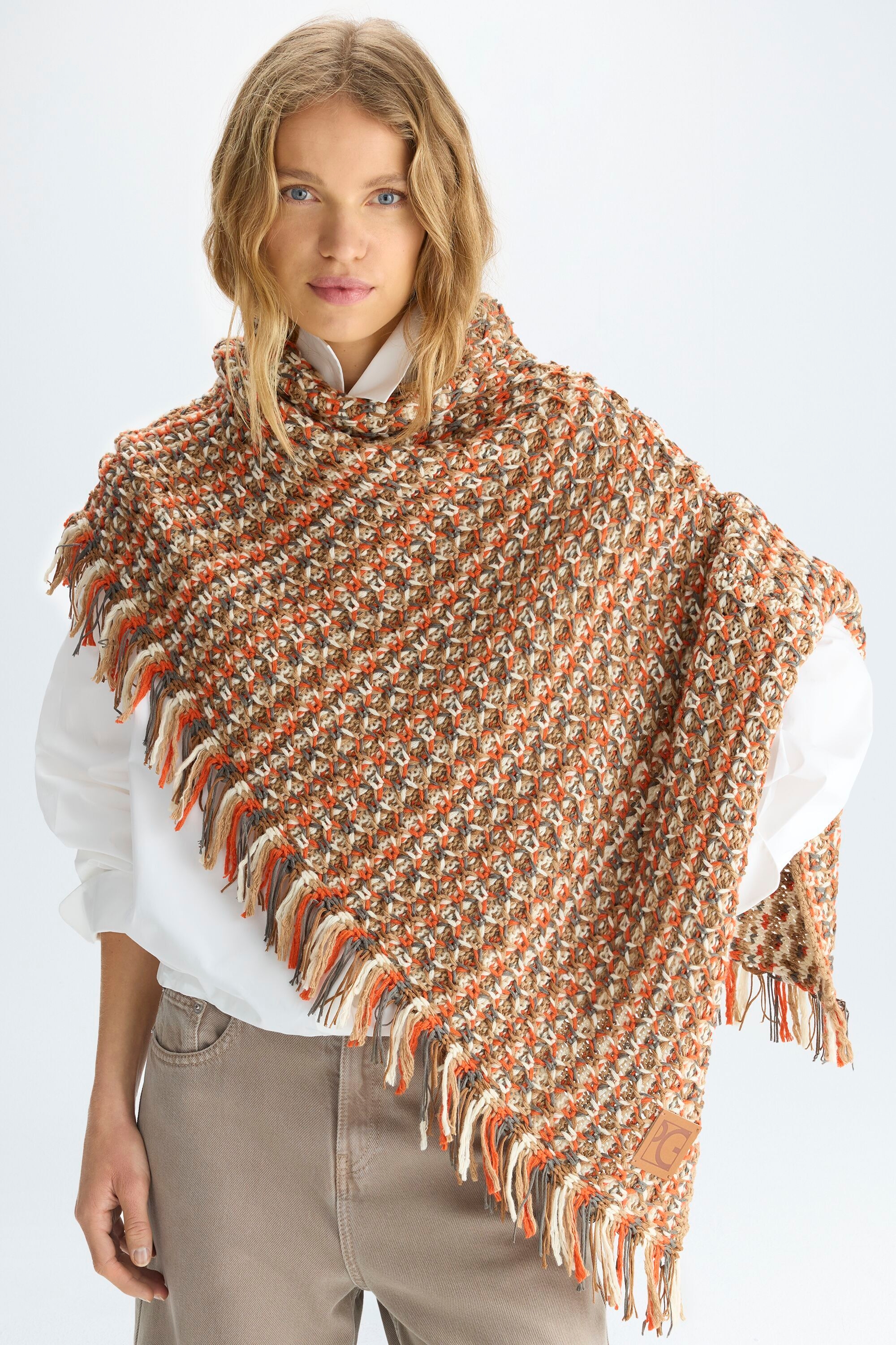 Fringed woven asymmetric scarf poncho