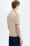 Striped knit half-zip polo shirt