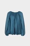 Blusa globo chiffon semitransparente
