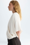 Draped crepe wrap cocoon-fit top