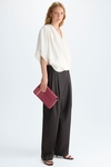 Draped crepe wrap cocoon-fit top