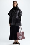 Origami-quilted combined oversize long gilet