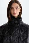 Origami-quilted combined oversize long gilet