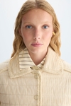 Quilted pleated nylon A-line jacket
