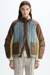 Bauhaus quilted nylon bomber coat