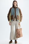 Bauhaus quilted nylon bomber coat