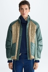 Bauhaus quilted nylon bomber coat