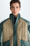 Bauhaus quilted nylon bomber coat