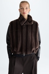 Faux-fur and faux-leather reversible bomber jacket