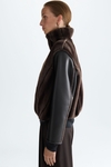 Faux-fur and faux-leather reversible bomber jacket