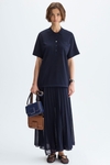 Semi-sheer pleated knit wrap skirt