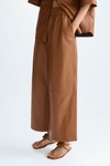 Faux-leather pyjama-style trousers