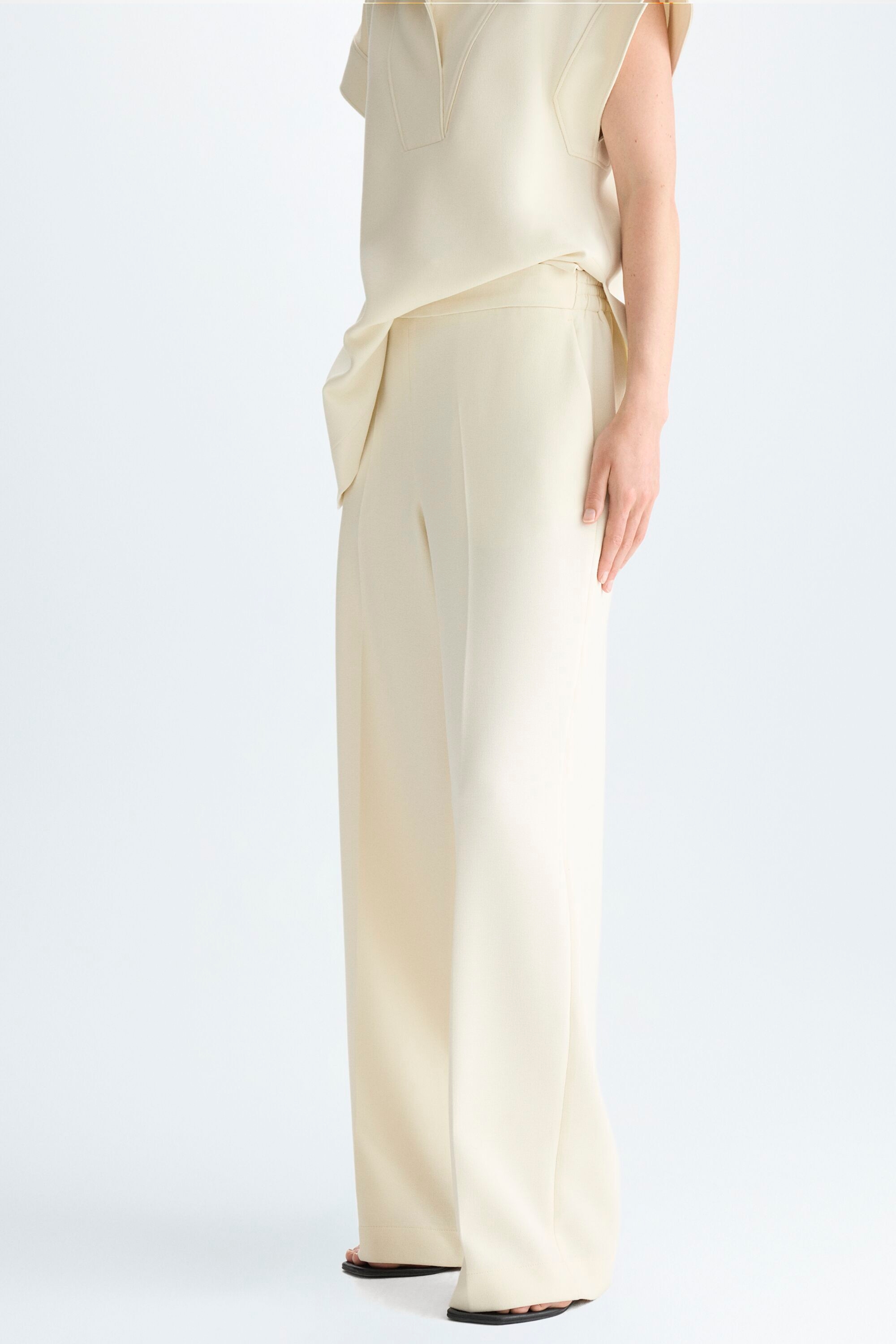 Puntini wide-leg trousers