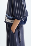 Camiseta oversize combinada estampado patchwork denim