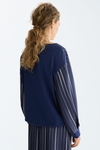 Camiseta oversize combinada estampado patchwork denim