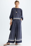 Camiseta oversize combinada estampado patchwork denim