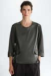 Faux-leather jersey A-line t-shirt with flaps