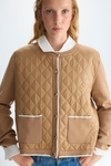 Stretch-knit quilted nylon straight-fit jacket