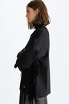Fringed wool oversize sweater