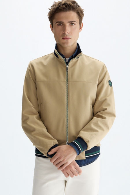 MESH-TEXTURED TECHNICAL JACKET