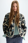 Calas print quilted reversible coat