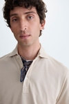 Textured spread collar polo shirt