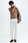 Origami textured knit polo shirt