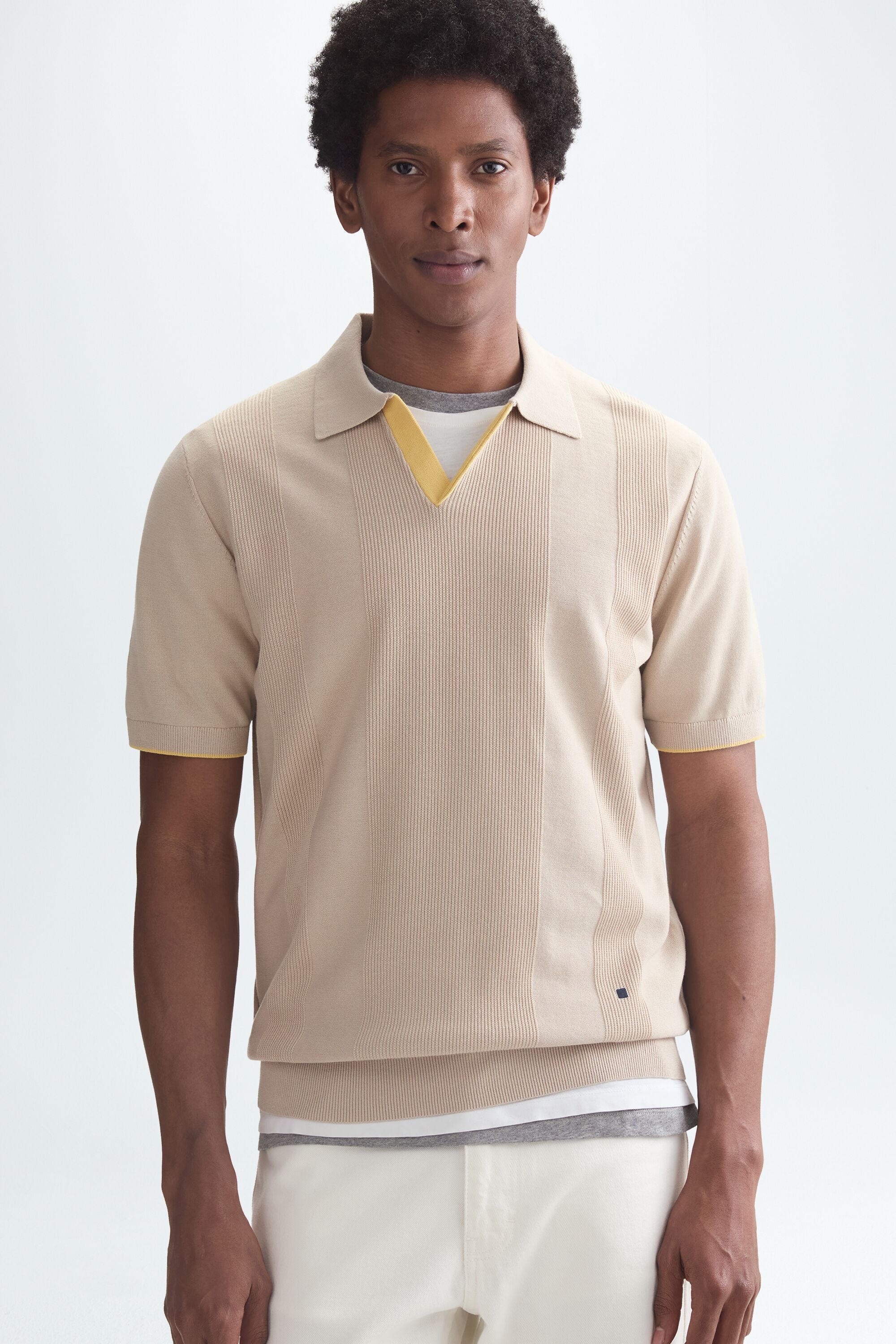 Striped textured knit polo shirt