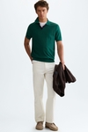 Striped textured knit polo shirt
