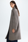 Double-faced oversize houndstooth coat