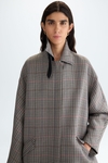 Double-faced oversize houndstooth coat