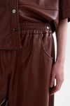 Faux-leather barrel trousers