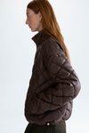 Faux-leather cocoon quilted coat