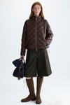Faux-leather cocoon quilted coat