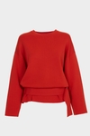Stretch-knit oversize sweater with belt