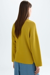 Stretch-knit oversize sweater with belt