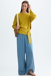 Stretch-knit oversize sweater with belt