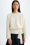 Stretch-knit oversize sweater with belt