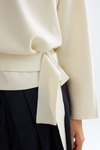 Stretch-knit oversize sweater with belt
