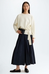 Stretch-knit oversize sweater with belt
