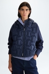 Chaqueta combinada acolchado capucha