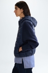 Chaqueta combinada acolchado capucha