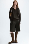 Oversized sweater with detachable fur collar